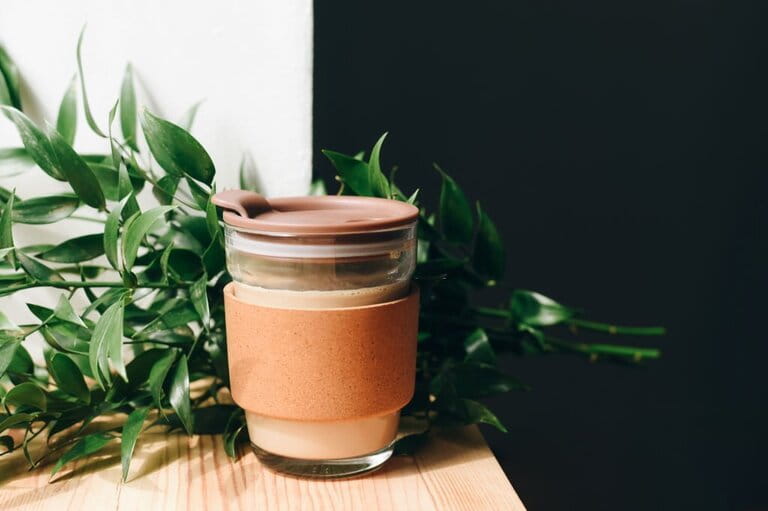 tumblers isolated on wooden table