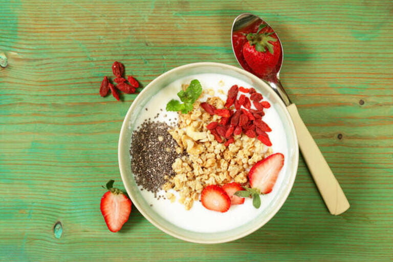 healthy breakfast of muesli, yoghurt, chia seeds, fruit and goji healthy breakfast of muesli, yoghurt, chia seeds, fruit and goji