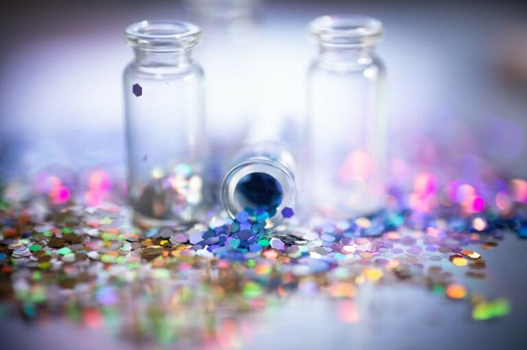Colorful glitter spilled from bottle